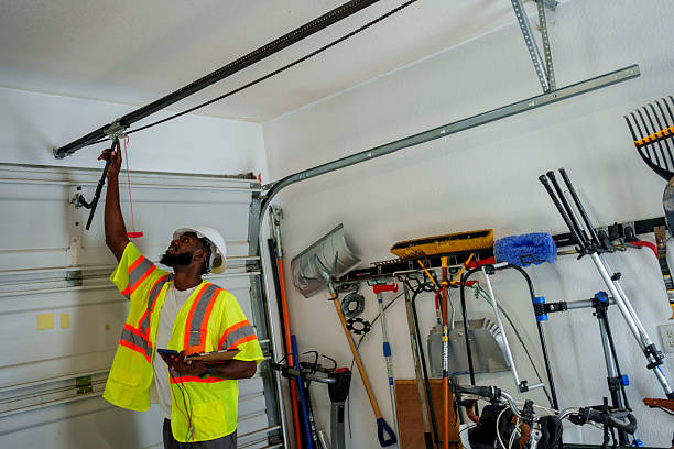 Professional Garage Door Panel Replacement technician working in Bromley, KY
